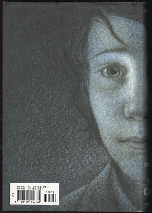 The Invention of Hugo Cabret by Brian Selznick with a close-up of a young boy's face