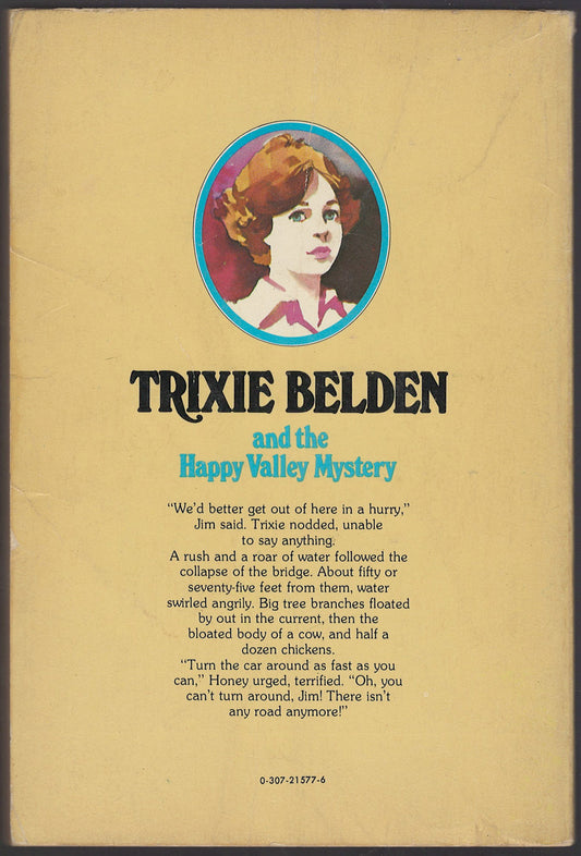 Back cover of Trixie Belden and the Happy Valley Mystery with a portrait of Trixie