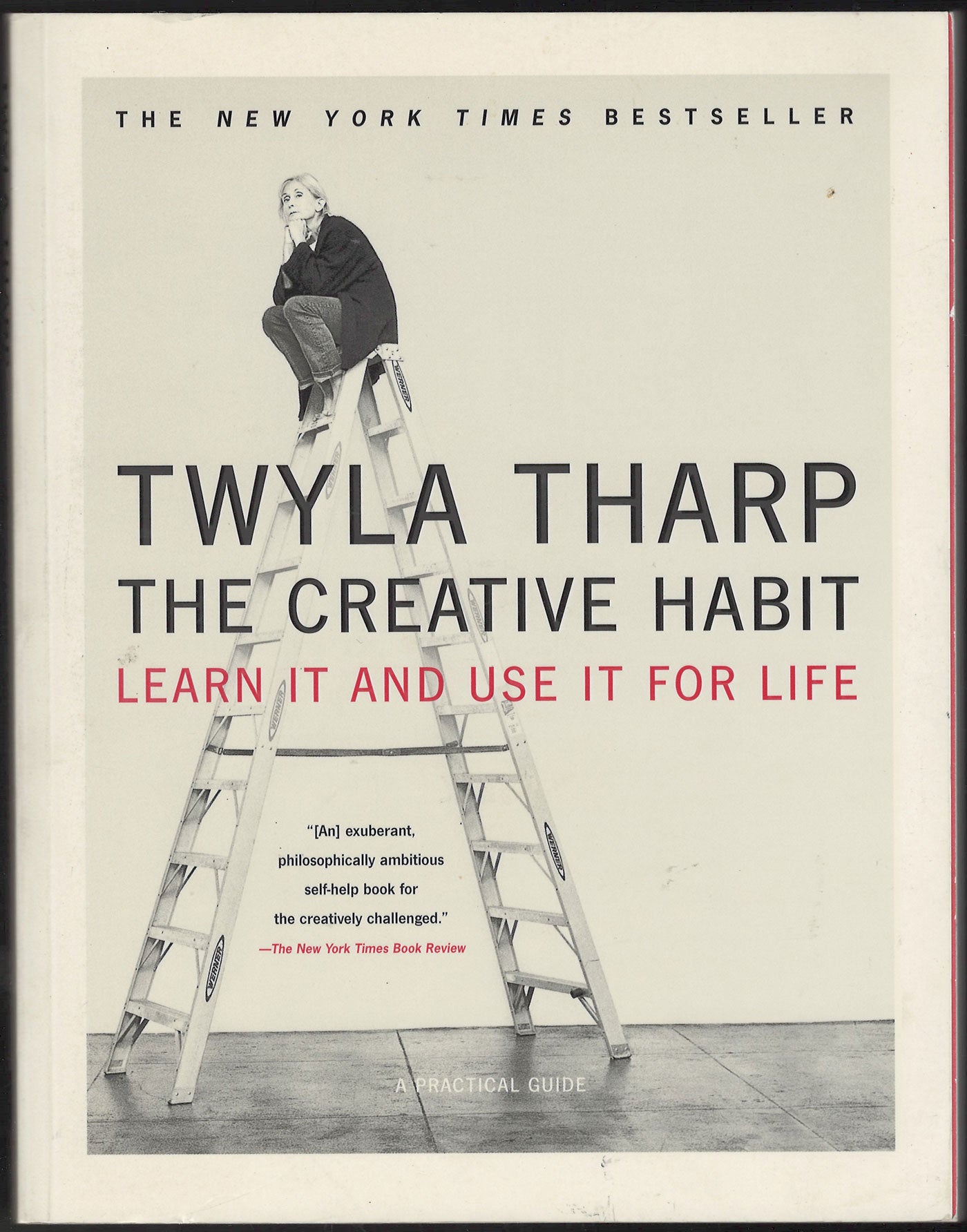 The Creative Habit by Twyla Tharp with a person on a ladder.