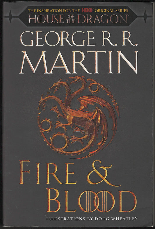 Front cover of Fire & Blood by George R.R. Martin with a dragon emblem on a dark background.