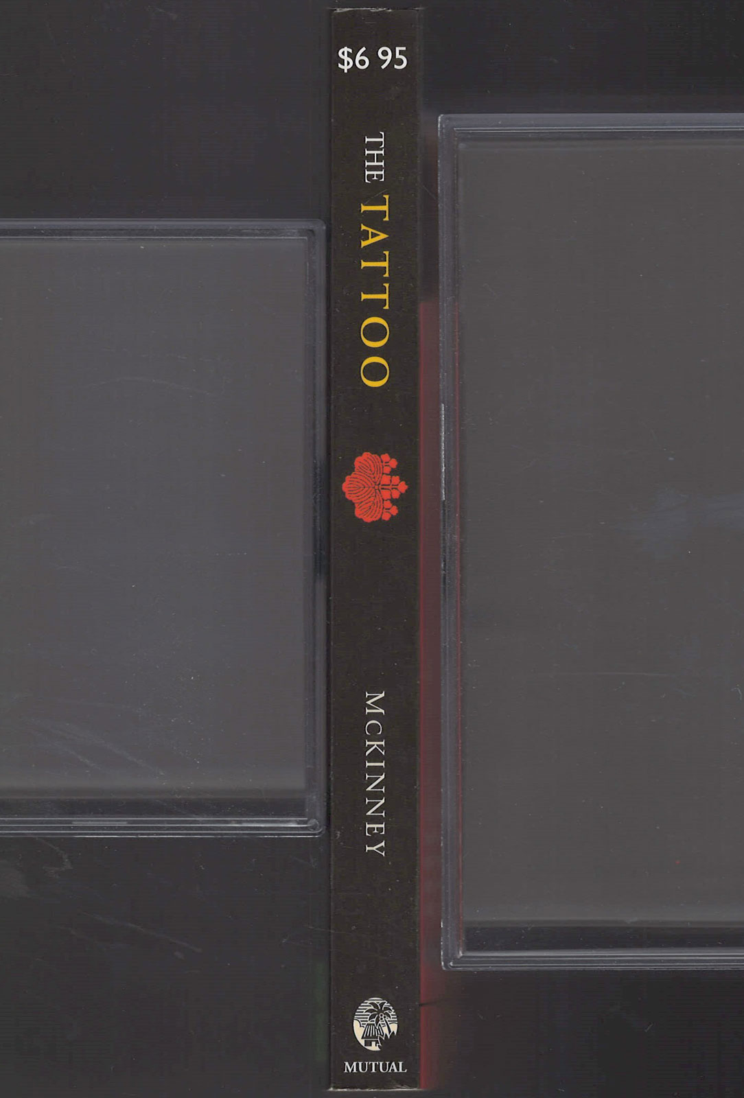 The Tattoo by Chris McKinney spine