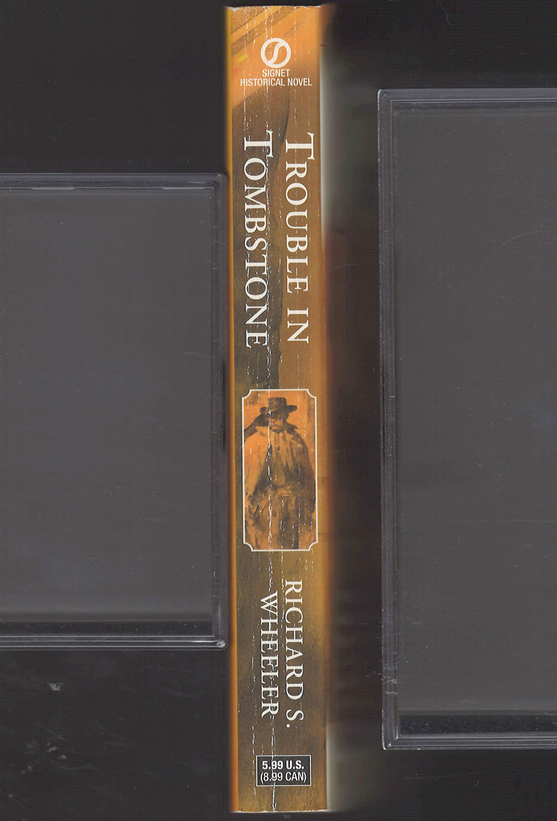 Trouble in Tombstone by Richard Wheeler spine
