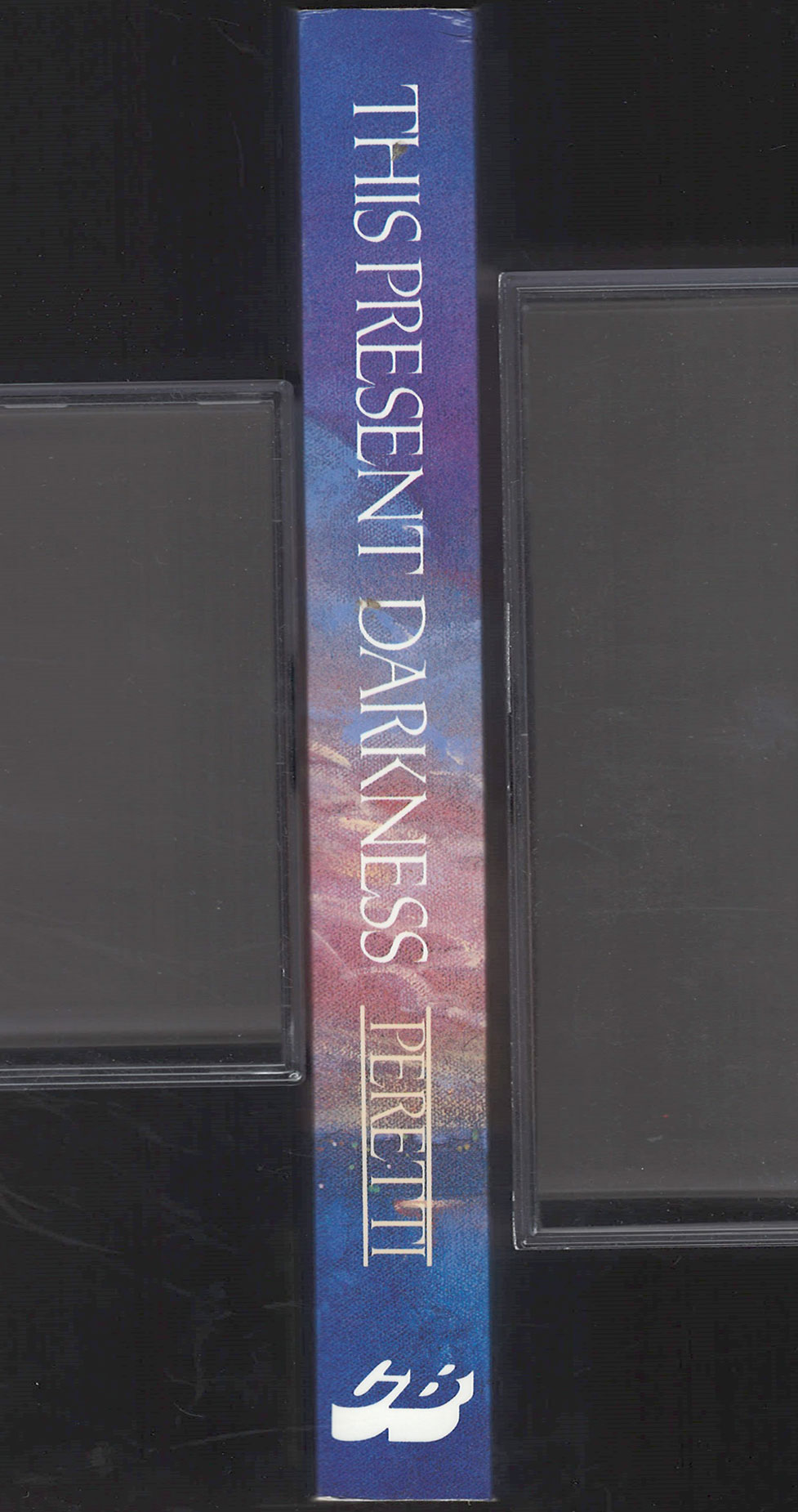 This Present Darkness by Frank Peretti spine