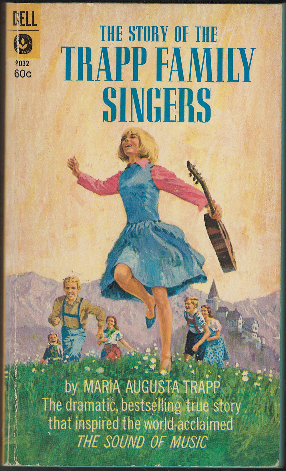 Front cover of The Story of the Trapp Family Singers with a woman in a blue dress holding a guitar.