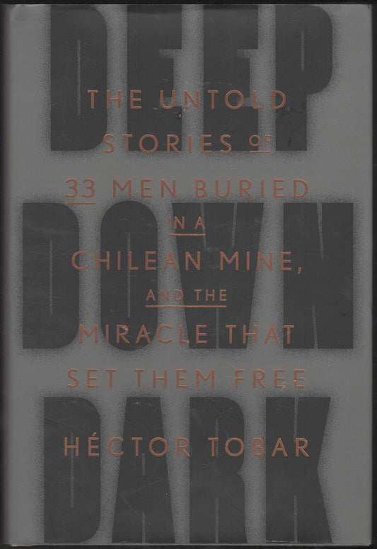 Front cover of Deep Down Dark by Héctor Tobar with a dark gray background and gold text.