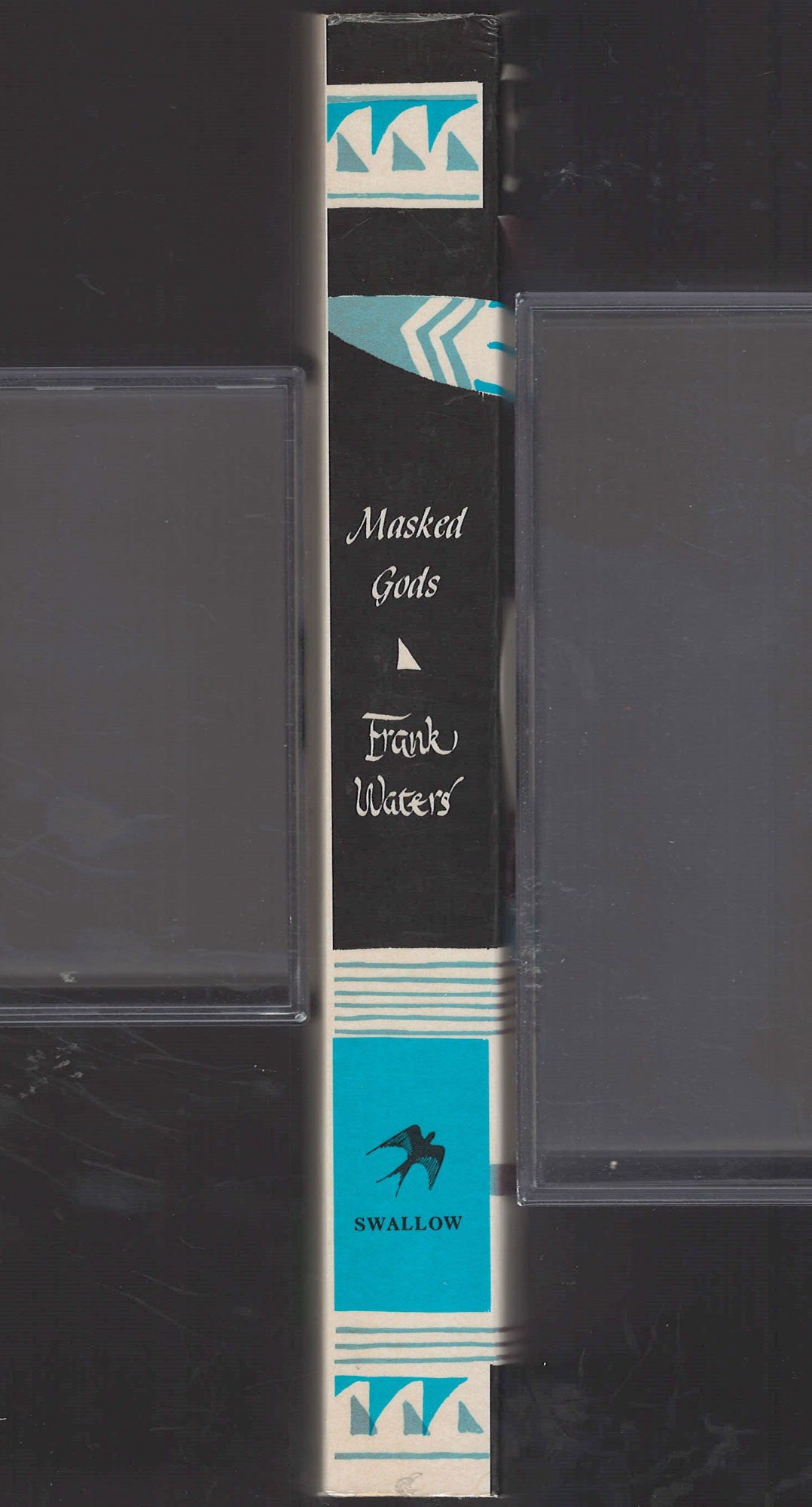 Masked Gods: Navaho & Pueblo Ceremonialism by Frank Waters spine
