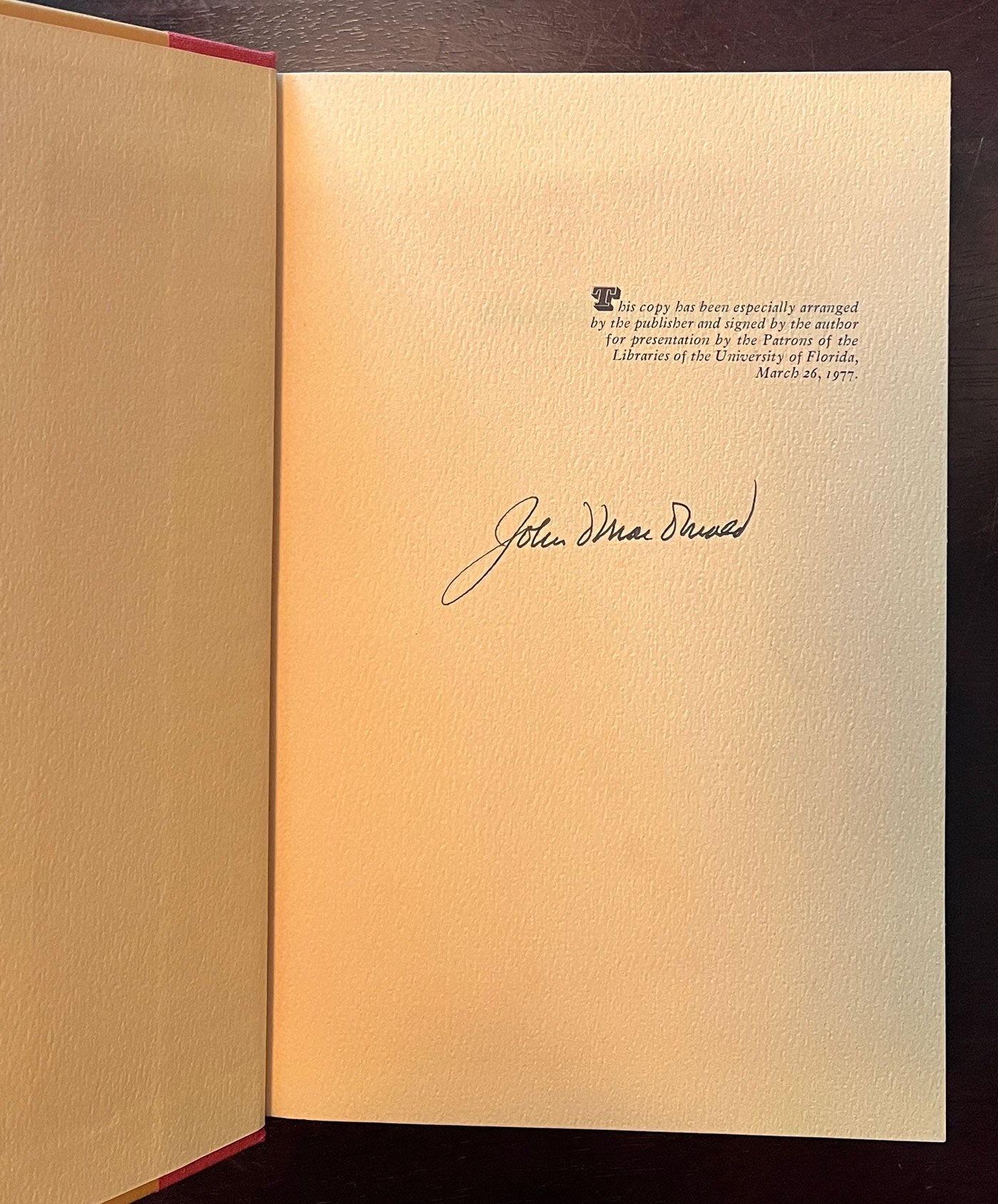 Condominium by John D. MacDonald first end page with signature.
