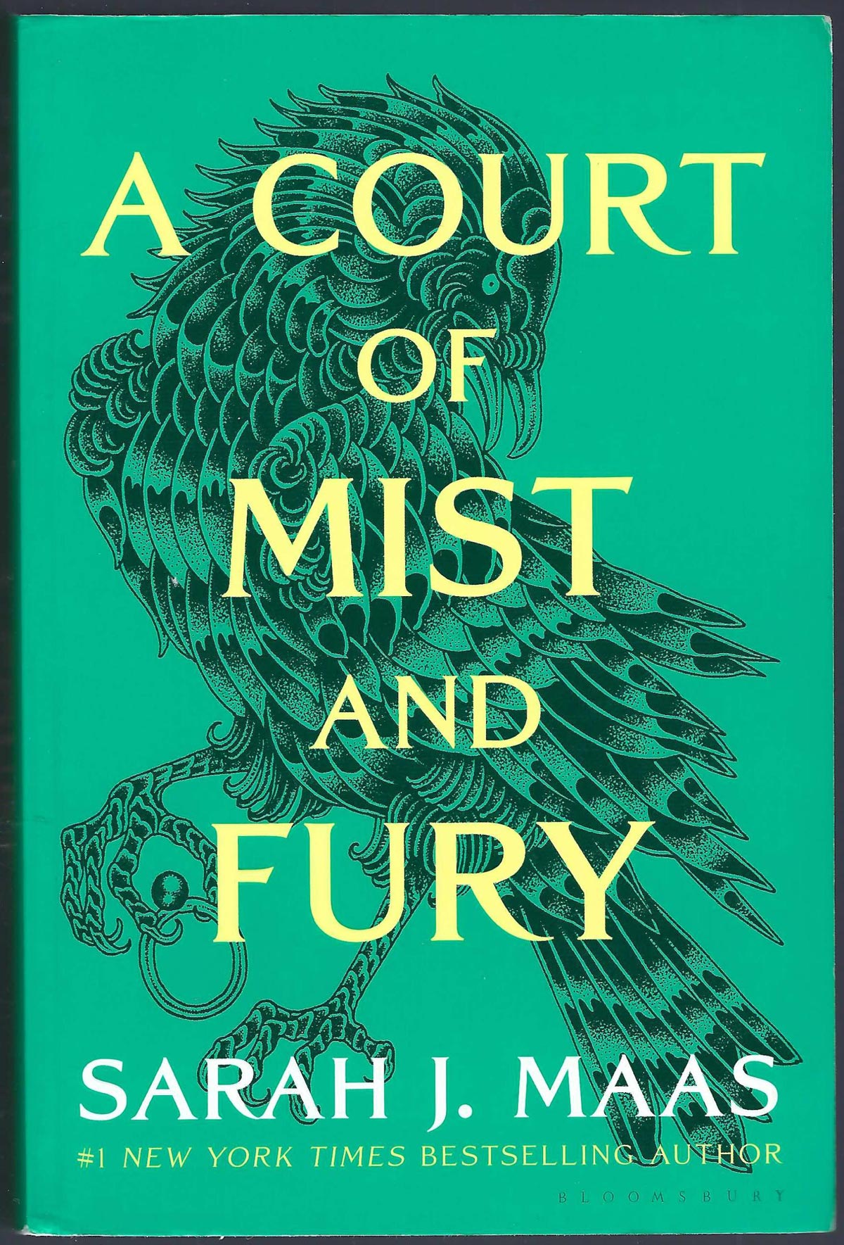 Front cover of A Court of Mist and Fury with a green background and bird illustration.