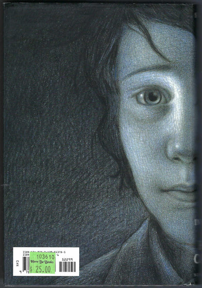 The Invention of Hugo Cabret by Brian Selznick with a close-up of a young boy's face