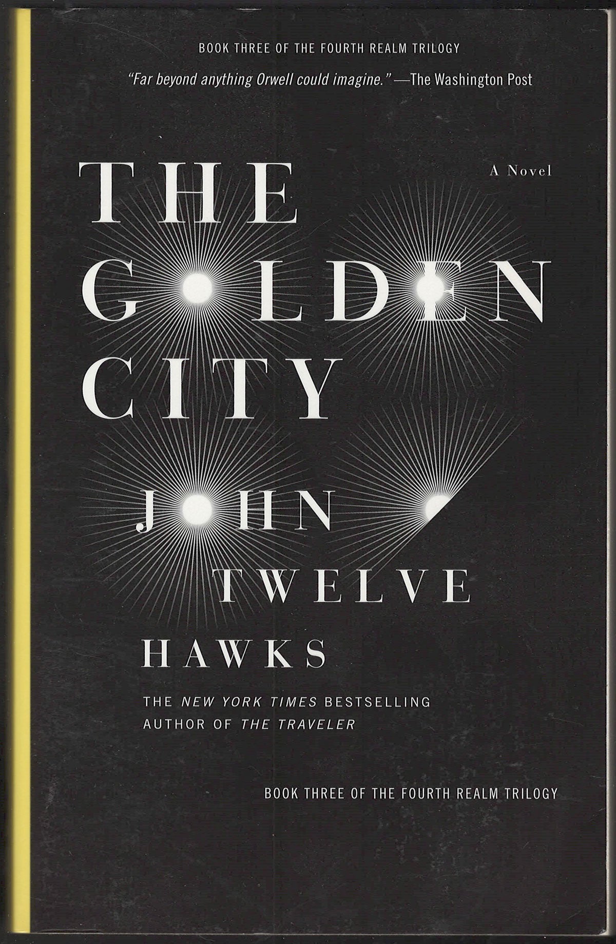 Front cover of The Golden City by John Twelve Hawks with a black background and white text.