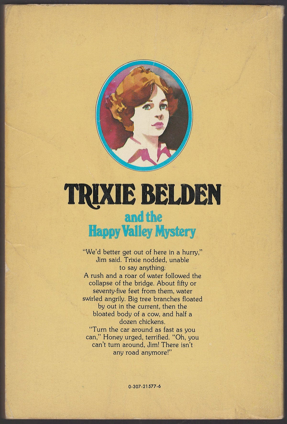 Back cover of Trixie Belden and the Happy Valley Mystery with a portrait of Trixie