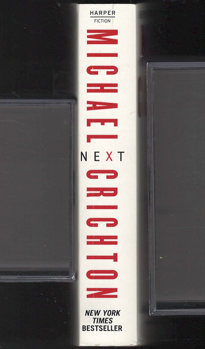Next by Michael Crichton spine
