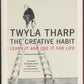 The Creative Habit by Twyla Tharp with a person on a ladder.