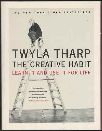 The Creative Habit by Twyla Tharp with a person on a ladder.