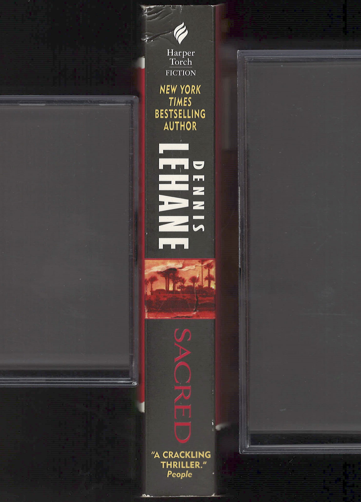 Sacred by Dennis Lehane spine