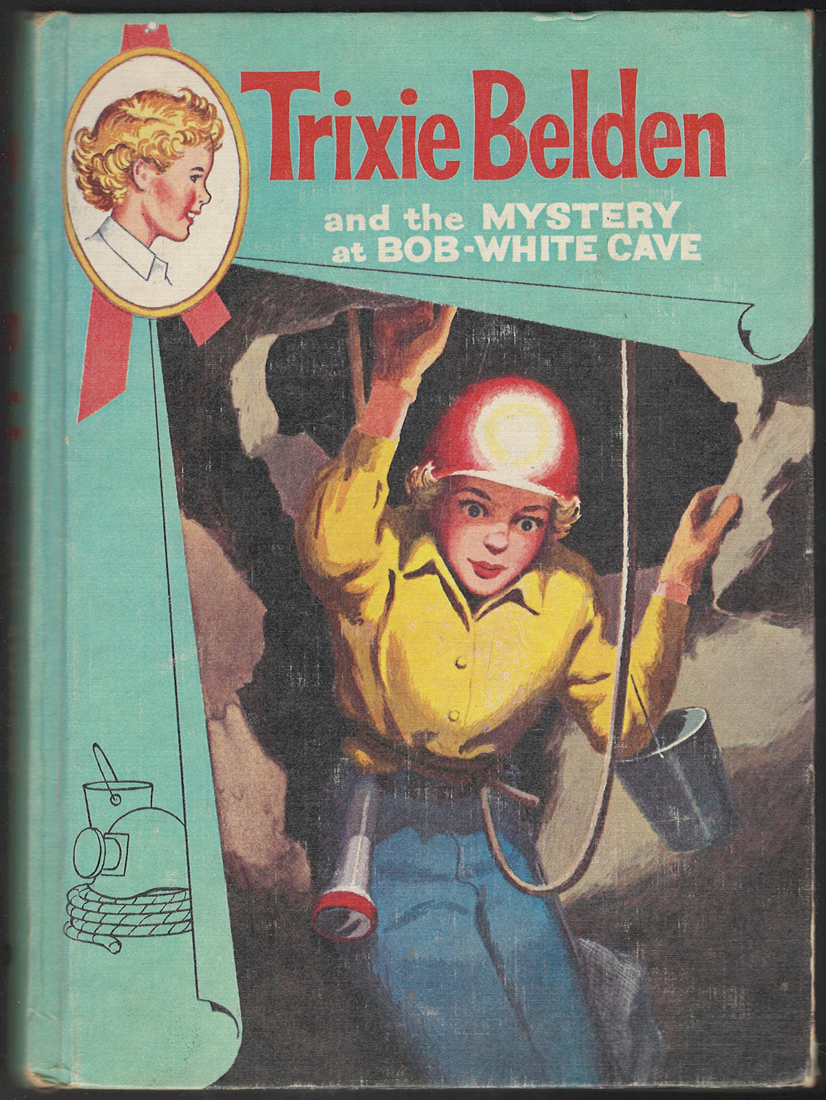 Trixie Belden and the Mystery at Bob-White Cave with n image of Trixie spelunking.