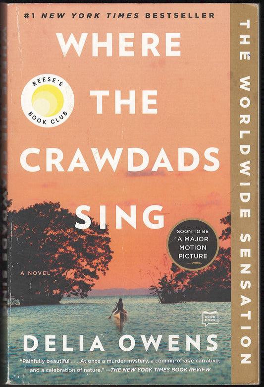Front cover of Where the Crawdads Sing by Delia Owens with a sunset over water scene.