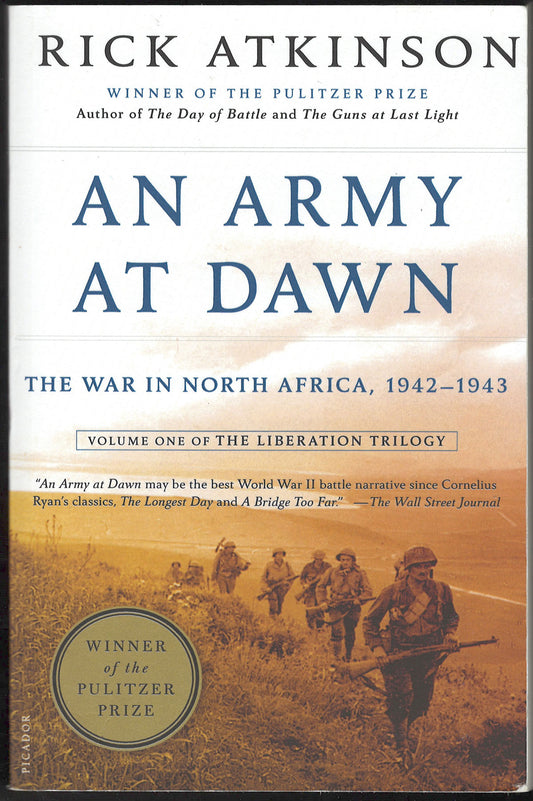 Front cover of An Army at Dawn by Rick Atkinson with soldiers walking through a field.