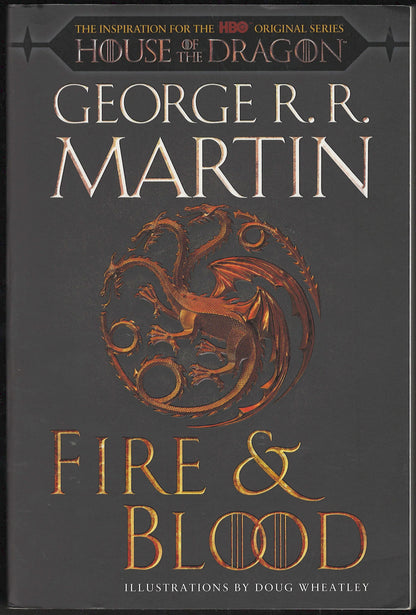 Front cover of Fire & Blood by George R.R. Martin with a dragon emblem on a dark background.