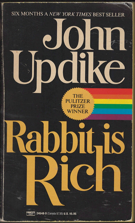 Front cover of Rabbit is Rich by John Updike with Pulitzer Prize winner badge on black background