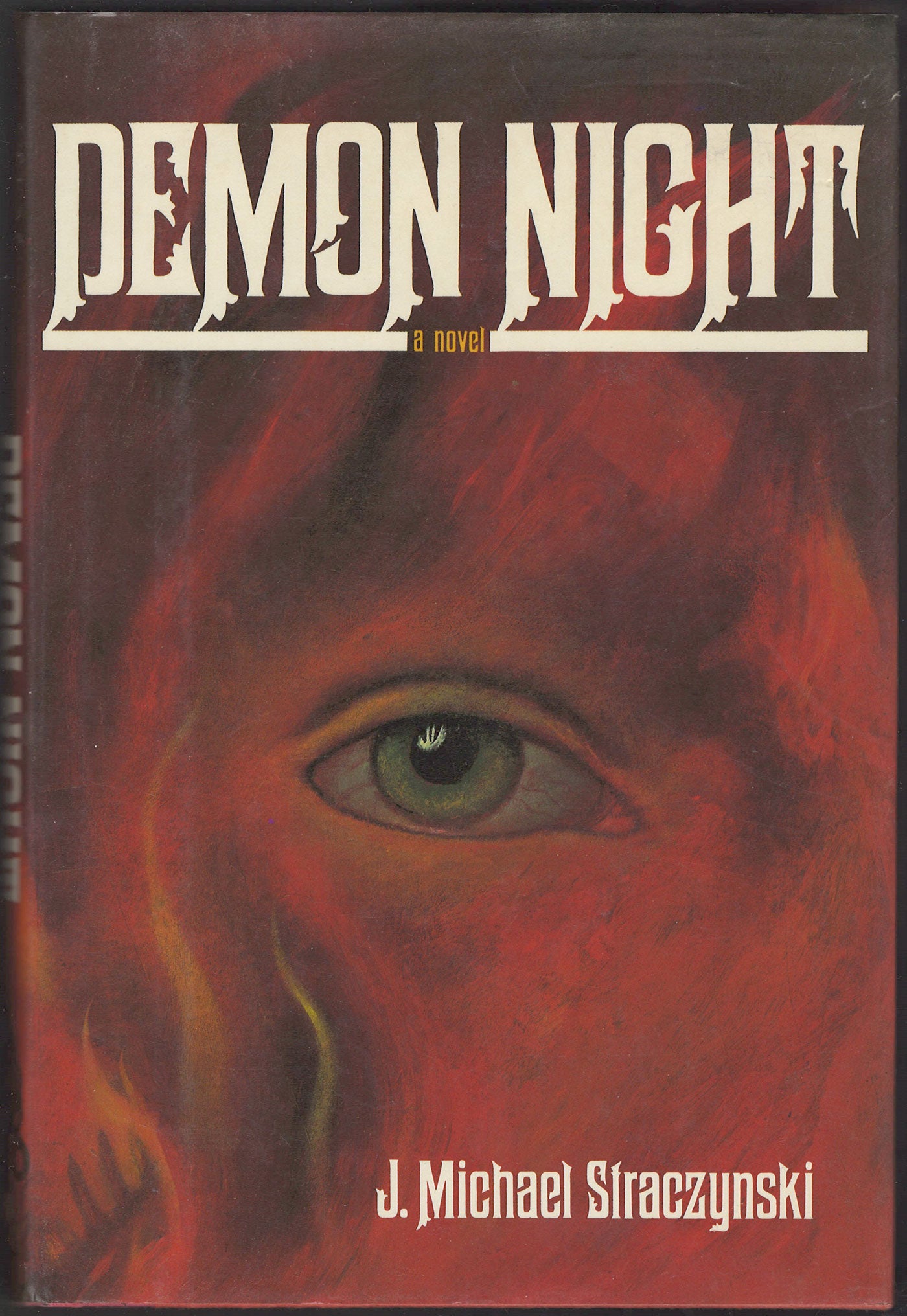 Front cover of Demon Night by J. Michael Straczynski with a close up of an eye set in a red face.