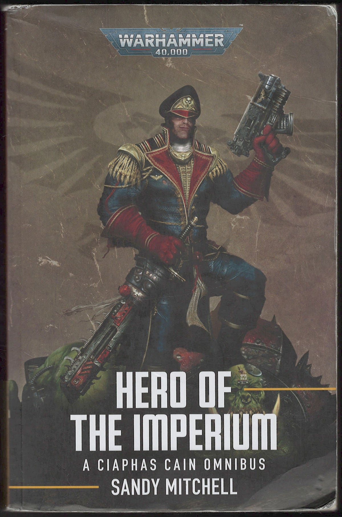 Front cover of Hero of the Imperium by Sandy Mitchell featuring a character from Warhammer 40,000.