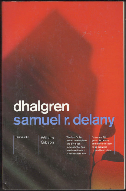 Front cover of Dhalgren by Samuel R. Delany with a red and black design.