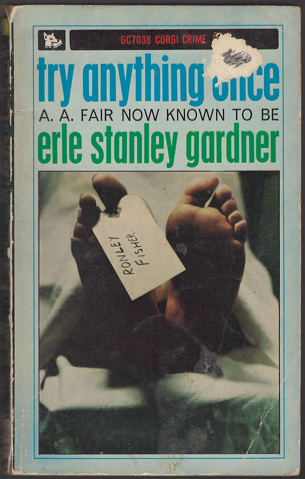 Front cover of Try Anything Once by A.A. Fair, with a toe tag on feet.