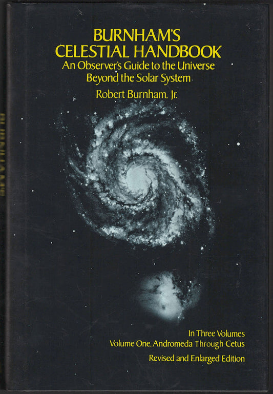 Front cover of Burnham's Celestial Handbook Volume One with celestial imagery on a dark background