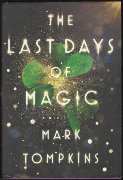 Front cover of The Last Days of Magic by Mark Tompkins with green leaves on a dark background.
