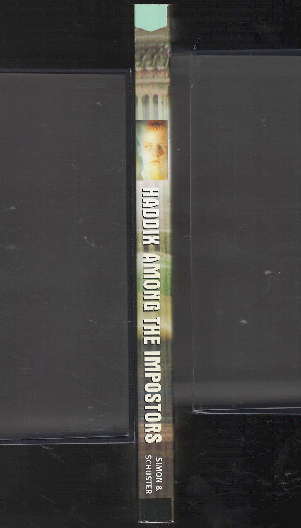 Among the Imposters by Margaret Peterson Haddix spine