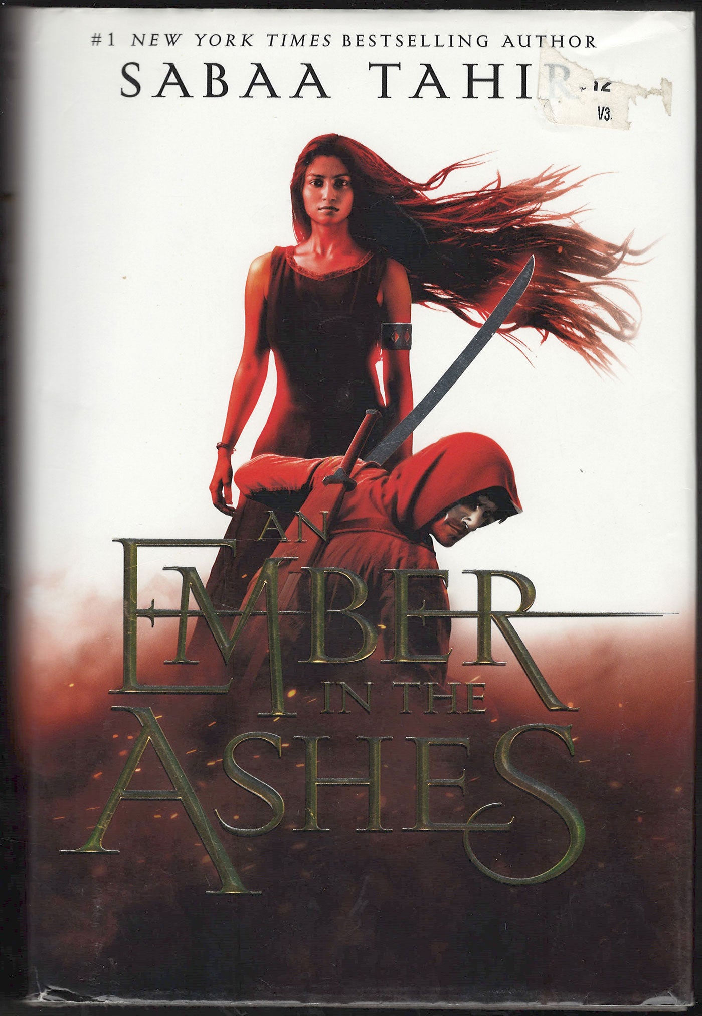 Front cover of Ember in the Ashes featuring a character with flowing hair.