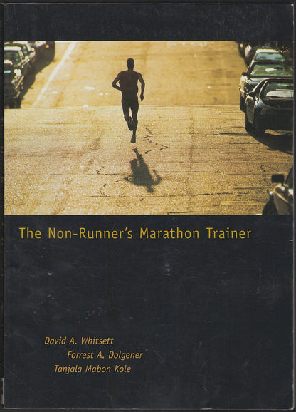 Front cover of The Non-Runner's Marathon Trainer with a runner on a road.