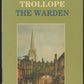 Front cover of The Warden by Anthony Trollope with a green background and an illustration of a town scene.