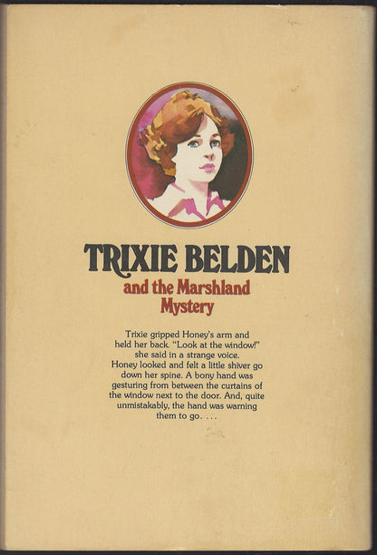 Back cover of Trixie Belden and the Marshland Mystery with a portrait Trixie.