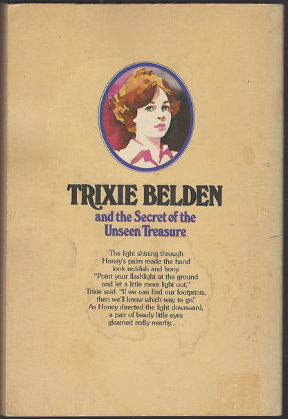 Back cover of Trixie Belden and the Secret of the Unseen Treasure with a portrait of Trixie.