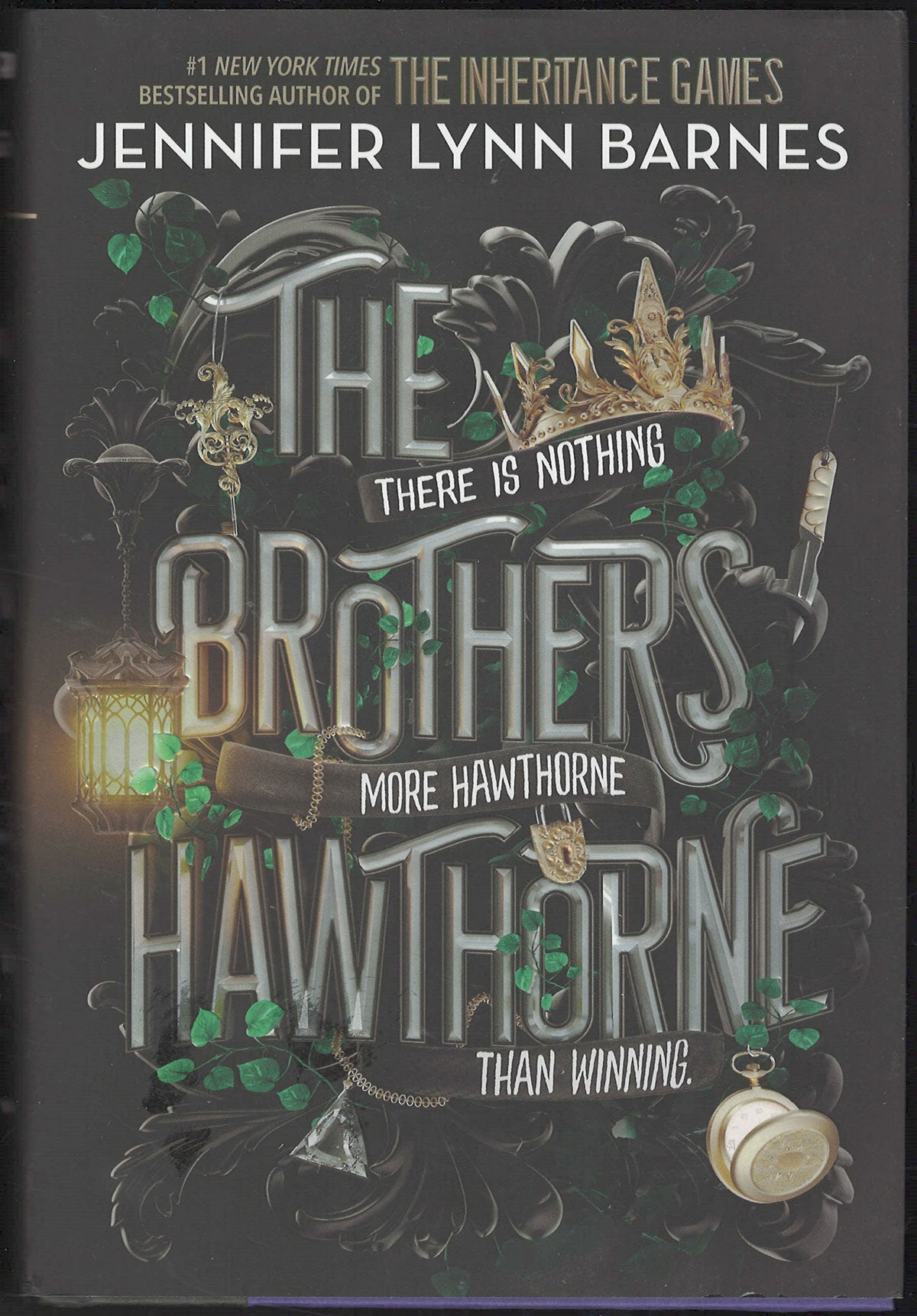 Front cover of The Brothers Hawthorne by Jennifer Lynn Barnes, featuring stylized silver lettering on a dark background with green ivy, a crown, lantern, and pocket watch illustrations.