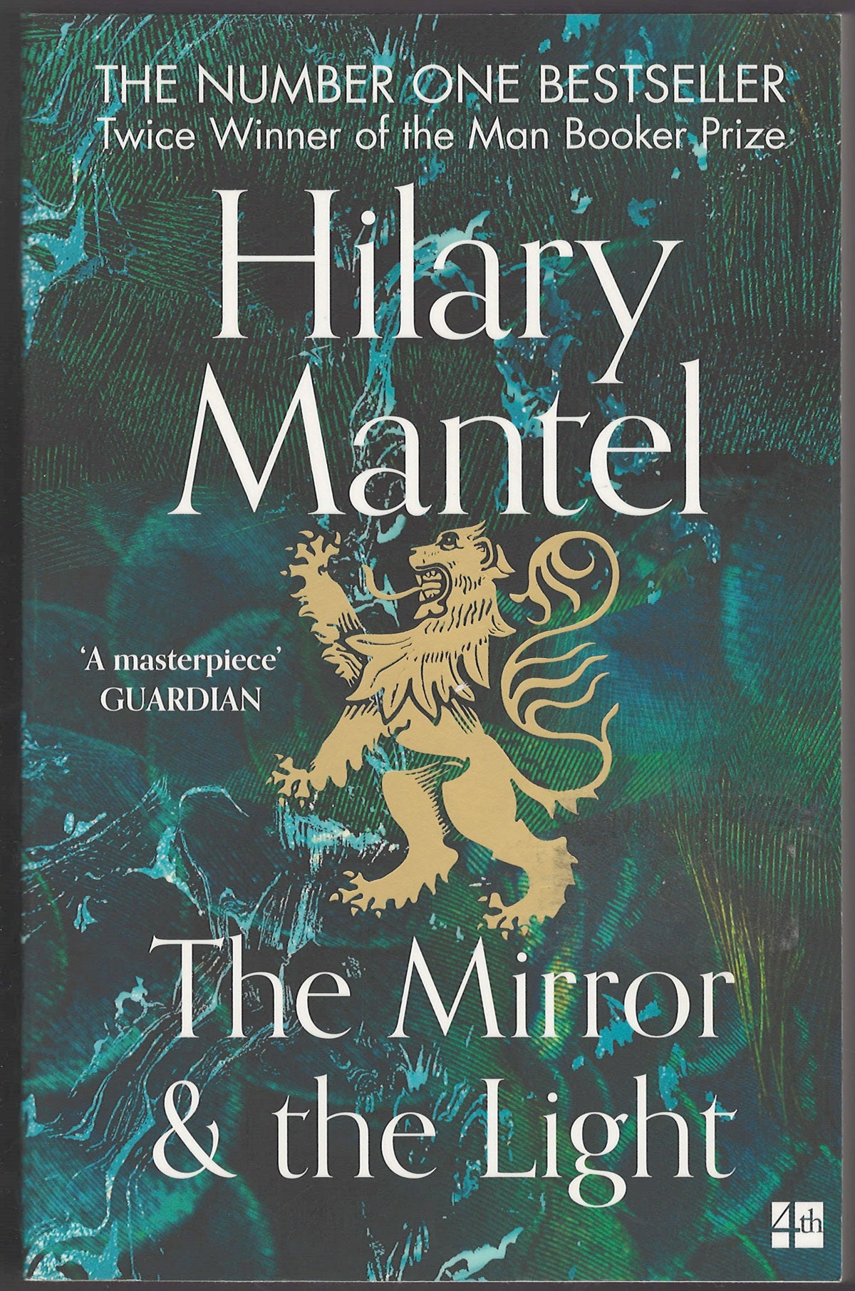 Front cover of The Mirror & the Light by Hilary Mantel with a lion rampant on a dark background.
