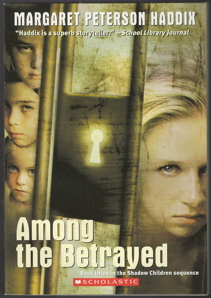 Front cover of Among the Betrayed by Margaret Peterson Haddix with images of children and a keyhole.