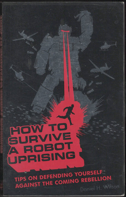 Front cover of How to Survive a Robot Uprising with a silhouette of a person and robot on a dark background.