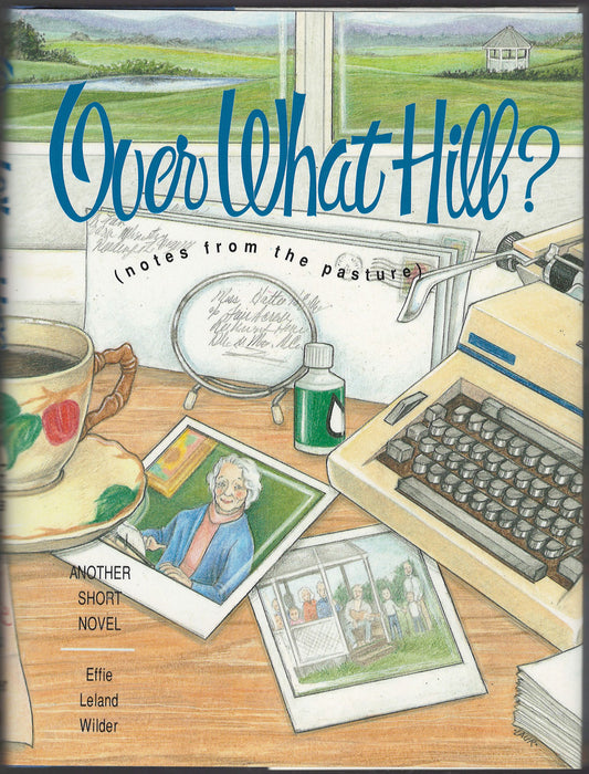 Front cover of Over What Hill? with a typewriter, photos, and a cup on a desk.