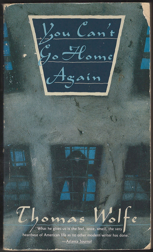 Front cover of You Can't Go Home Again by Thomas Wolfe with a dark, moody design.