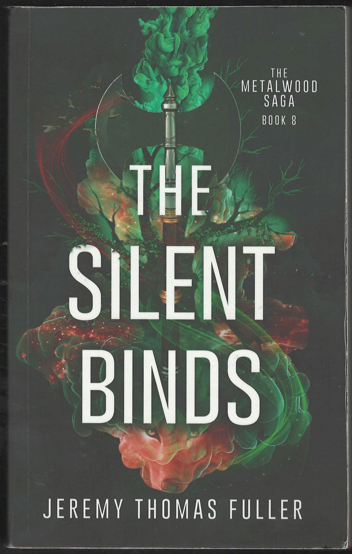 Front cover of The Silent Binds by Jeremy Thomas Fuller, featuring a dark background with large white title text and swirling green, red, and orange abstract menacing  artwork. 