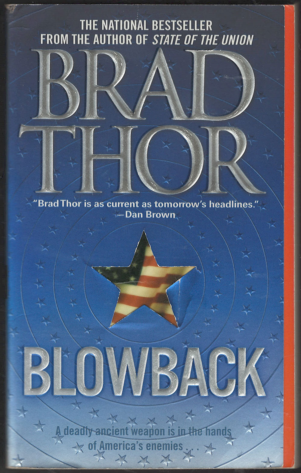 Front cover of Blowback by Brad Thor with an American flag star design.