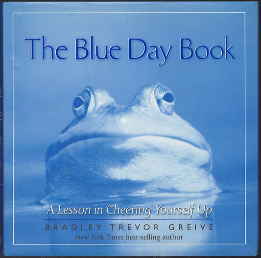 Front cover of The Blue Day Book with a frog's face and a blue color scheme.