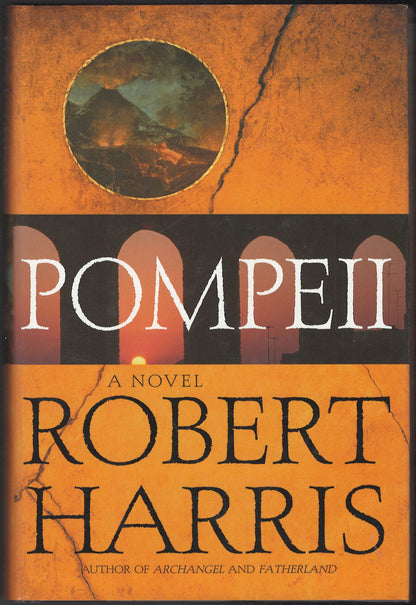 Front cover of Pompeii by Robert Harris with an orange and black design.