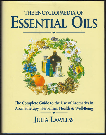 Front cover of The Encyclopaedia of Essential Oils by Julia Lawless, featuring illustrations of essential oils and herbs.