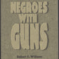 Front cover of Negroes with Guns by Robert F. Williams on a brown background