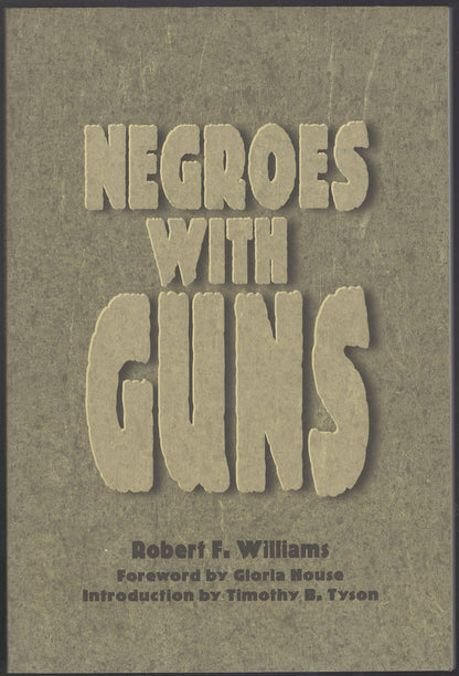 Front cover of Negroes with Guns by Robert F. Williams on a brown background
