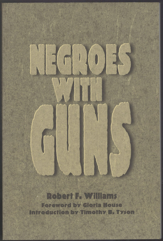 Front cover of Negroes with Guns by Robert F. Williams on a brown background